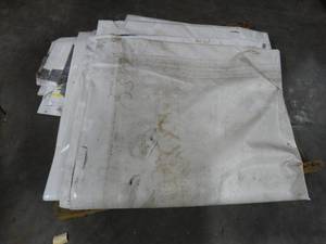 lot 1834 image: Pallet of a Few Bill-Board Sign Canvases
