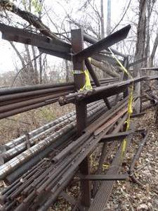 lot 1900 image: Variety of Diameter Solid Core Metal    All Contents on Metal Rack