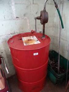 lot 29473 image: Partial barrel Mobil 766 Neat Cutting Oil w Crank Pump