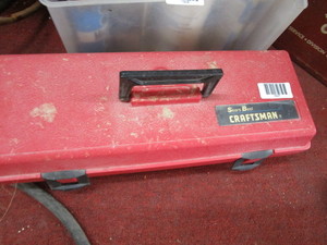 lot 1607 image: Craftsman case with dremel tool and contents