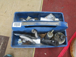 lot 1620 image: Pair of Crager center caps and assorted shop items