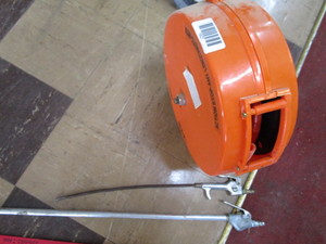 lot 1627 image: reel of air hose and two air guns