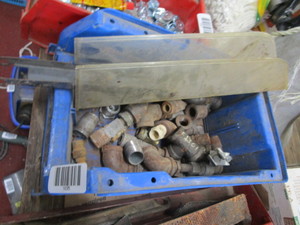 lot 1635 image: Bin with assorted plumbing supplies