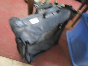lot 1669 image: Rolling hanging luggage