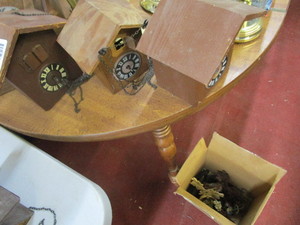 lot 1712 image: cuckoo clock parts and pieces