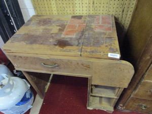 lot 25912 image: Antique sewing machine and cabinet - knee control - unspecified brand