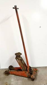 lot 28022 image: Hein Werner Commercial Hydraulic Floor Jack 1-14 Ton