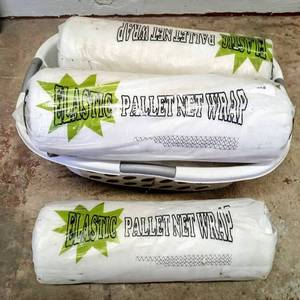 lot 28034 image: Lot of 5 Rolls - Elastic Pallet Net Wrap - Measurements are in the Photos