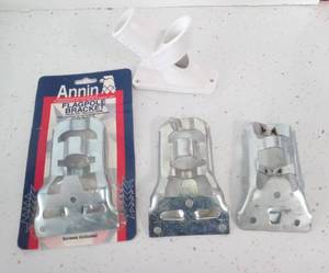lot 28057 image: Lot of 3 Metal Flagpole Brackets & 1 Plastic