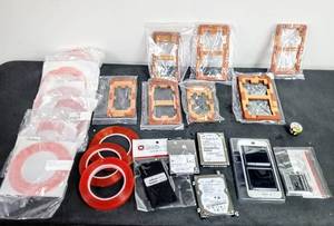 lot 28064 image: Cell Phone Repairing Lot - Alignment Molds (for dif. phones), 8 Rolls of 36 yd. Double Sided Adhesive & More