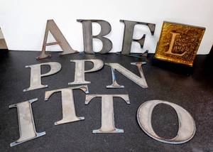 lot 28073 image: Lot of 10 - 6 inch Metal Cut-Out Letters & Live, Love, Laugh Decor