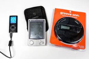 lot 28082 image: Blast From the Past 1990s Casio Cassiopeia E-125 Windows Powered Pocket PC, Portable CD Player wFM Radio & a 2 GB MP3 Player