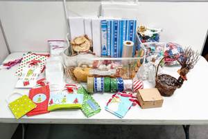 lot 28113 image: Suitcase Size Bag Full of Holiday Goodies Gift Boxes & Bags, Ribbon, Bows & Decor