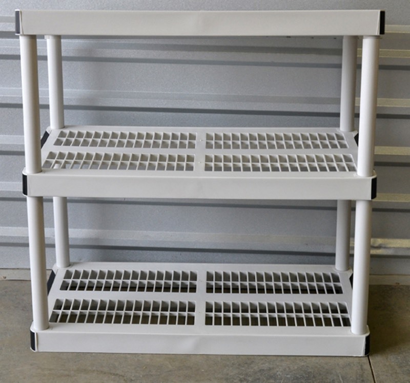Plastic Shelving Unit 4 3 shelves and misc. storage containers