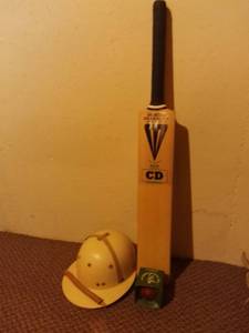 lot 605 image: Cricket Bat Helmet and Ball