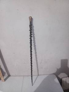 lot 1263 image: Old School Tree Branch Walking Stick With NV And Two Hands Shaking Carved Into It