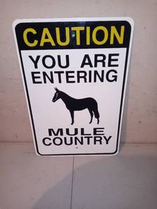 lot 1203 image: Thon Metal Entering Mule Country Sign
