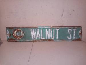lot 1213 image: Old Metal Lions International Raised Letter Walnut St.