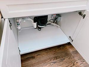lot 48790 image: VANCE Trimmable Under Sink Tray for 36 in. Base Cabinet  Protects Cabinets from Leaks and Spills  Adjustable Spill Guard for Kitchen and Bathroom Sinks