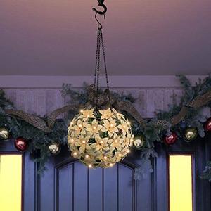 lot 1568 image: Alpine Corporation QLP924SLR-WT Solar Christmas Hanging Poinsettia Ornament with LED Light Indoor and Outdoor Festive Holiday D�cor, 8-Inch, White