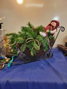 lot 4968 image: Snowman in a sleigh