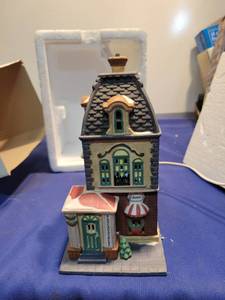lot 5115 image: Heritage Village collection Christmas in the city series Haberdashery Needs light bulb