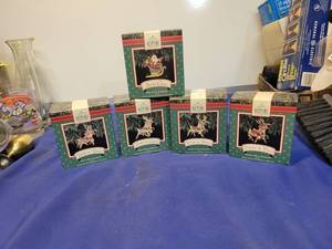 lot 5123 image: Hallmark keepsake ornament santas rain deers and Santa Claus