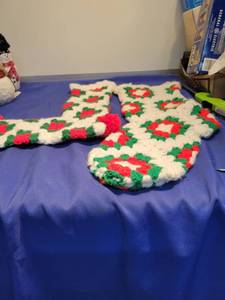 lot 5179 image: His and hers crochet Christmas stocking