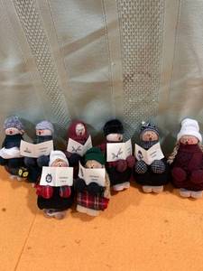 lot 7032 image: Christmas Caralers 4 12 inches high Made in 1996 Thur 99 by Sacred Heart school kids