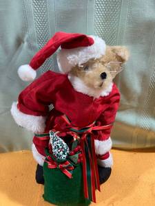 lot 7067 image: Christmas Santa bear with bag of toys on stand