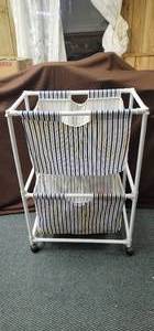 lot 1755 image: Clothes bin on wheels 25 12 W x 16 D x 37 H