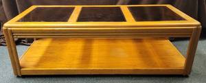 lot 1759 image: Wooden coffee table on wheels wglass top 51 W x 23 12 D x 17 H