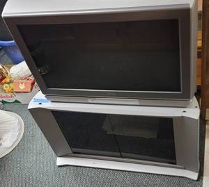 lot 1767 image: Toshiba big back TV wremote  & swivel TV stand wglass doors