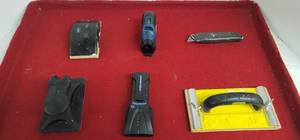 lot 1814 image: Sanding blocks, box knife, & stud finder