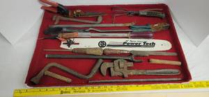 lot 1876 image: Pipe wrench, garden tools, door hardware, chainsaw deck, & more