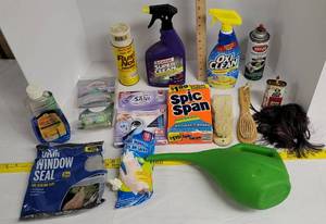 lot 1901 image: Cleaning supplies, window seal, garden pitcher