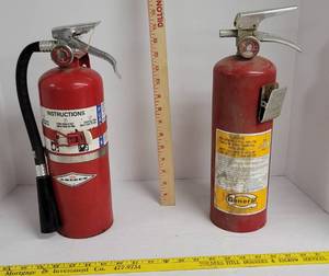 lot 1911 image: (2) Fire extinguisher (1 has been used and empty)