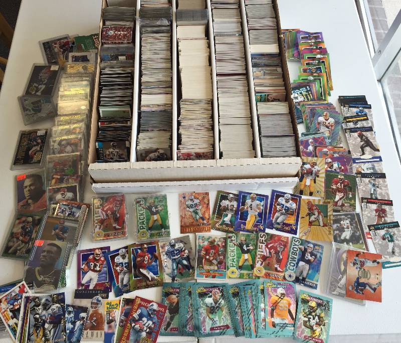 lot 1008 image: 5,000 Count Box Jam Packet With Football Superstars - Rookies - Inserts & More - Book Value Over $500 - A True Treasure Hunt