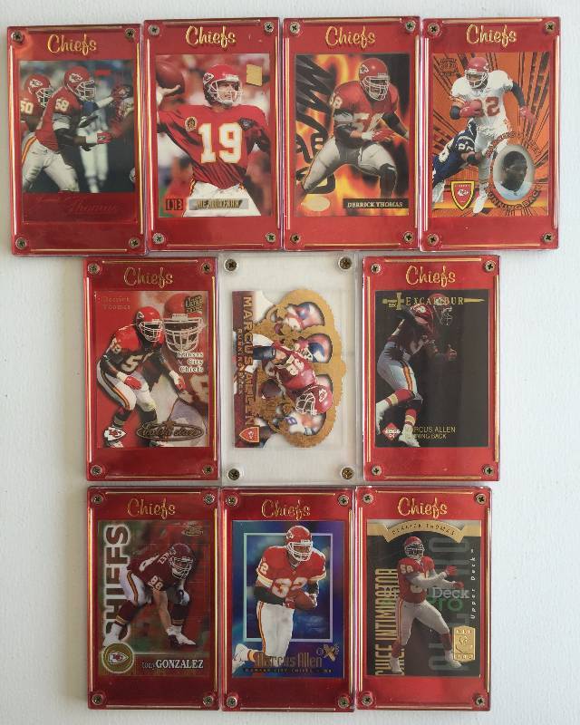 lot 1010 image: (10) Kansas City Chiefs Legends in Awesome Chiefs Display Holders - Derrick Thomas, Joe Montana, Tony Gonzalez, Marcus Allen