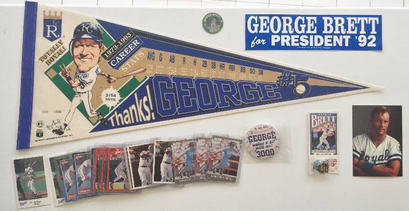 lot 1024 image: Amazing George Brett Lot - Extremely Rare Pieces - Serial #d Pennant - Incredibly Rare Bumper Sticker, Pins, Cards 