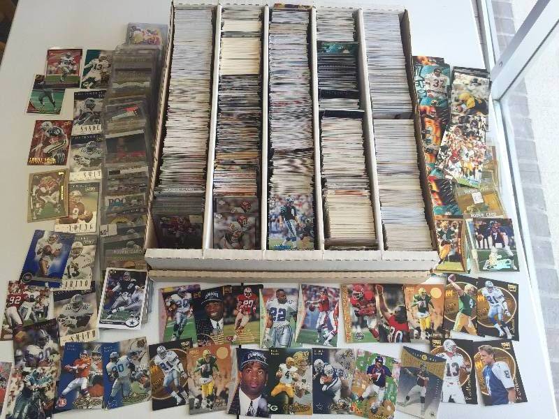 lot 1030 image: 5,000 Count Box Jam Packet With Football Superstars - Rookies - Inserts & More - Book Value Over $500 - A True Treasure Hunt