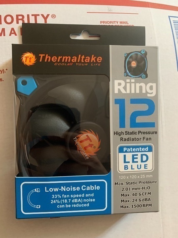 lot 214 image: Thermaltake Riing 12 High Static Pressurr Radiator Fan Patented LED Blue. Comes with Low-Noise Cable