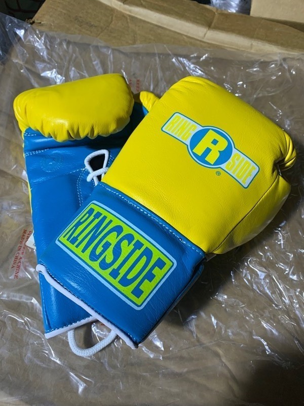lot 22 image: Pair of Genuine Leather Official Pro 12oz. Ringside Fight Gloves