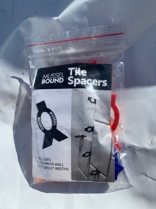 lot 328 image: 50 Bags w 18 Tile Spacers In Each Bag