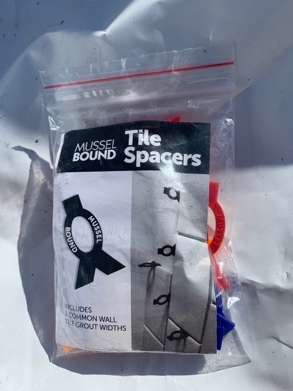 lot 331 image: 50 Bags w 18 Tile Spacers In Each Bag