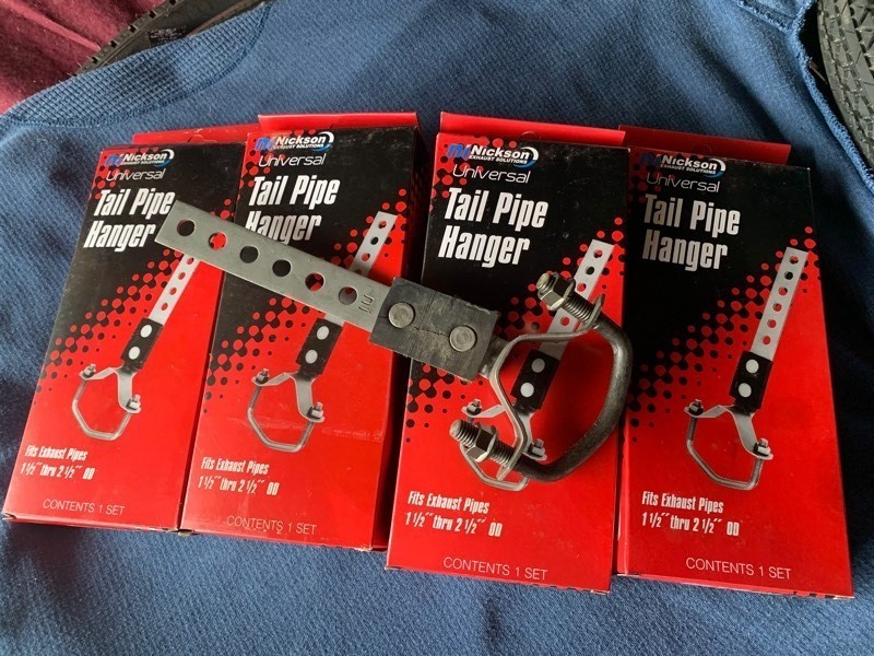 lot 34 image: Set of 4 New Nickson Universal Tail Pipe Hangers