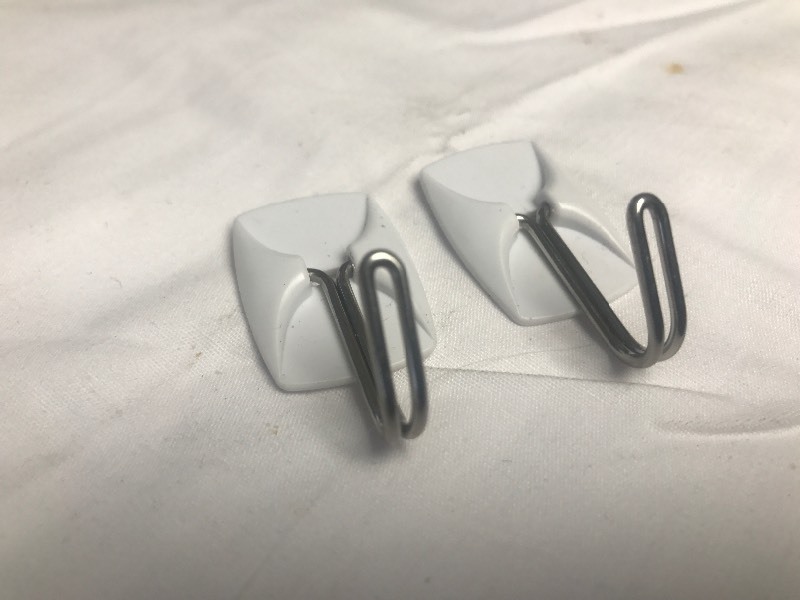 lot 411 image: Bulk lot of 50 storage hooks put them anywhere just use two-sided tape and stick them on walls closets use your imagination to hang keys all kinds of uses