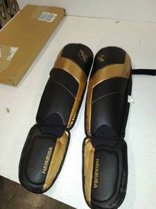 lot 6975 image: Hayabusa Kickboxing Shinguards T3 Black Gold