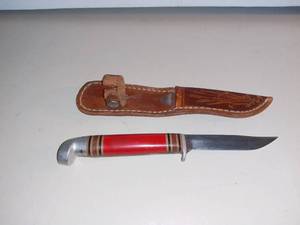lot 1002 image: Vintage Western Auto Red Handled Knife With Sheath