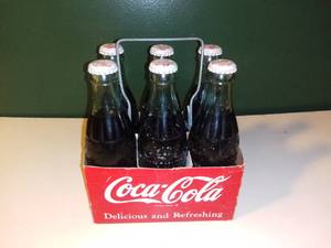 lot 3003 image: Vintage Coke Bottles With Cardboard Carrier